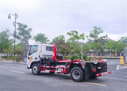 重汽豪曼國六藍(lán)牌勾臂垃圾車